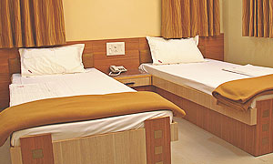 Bed Room with Separate Beds for Elderly People